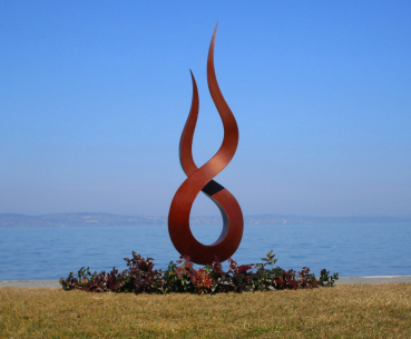 Flame garden sculpture rusty
